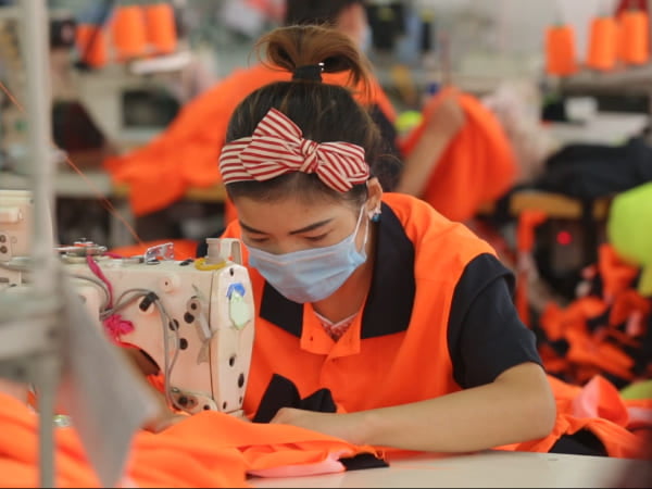 Modern underwear factories production floor with quality control stations